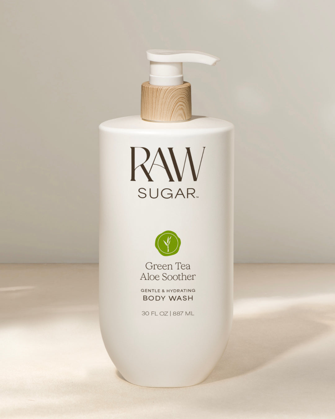 RAW Sugar Green Tea Aloe Soother body wash bottle on a light background