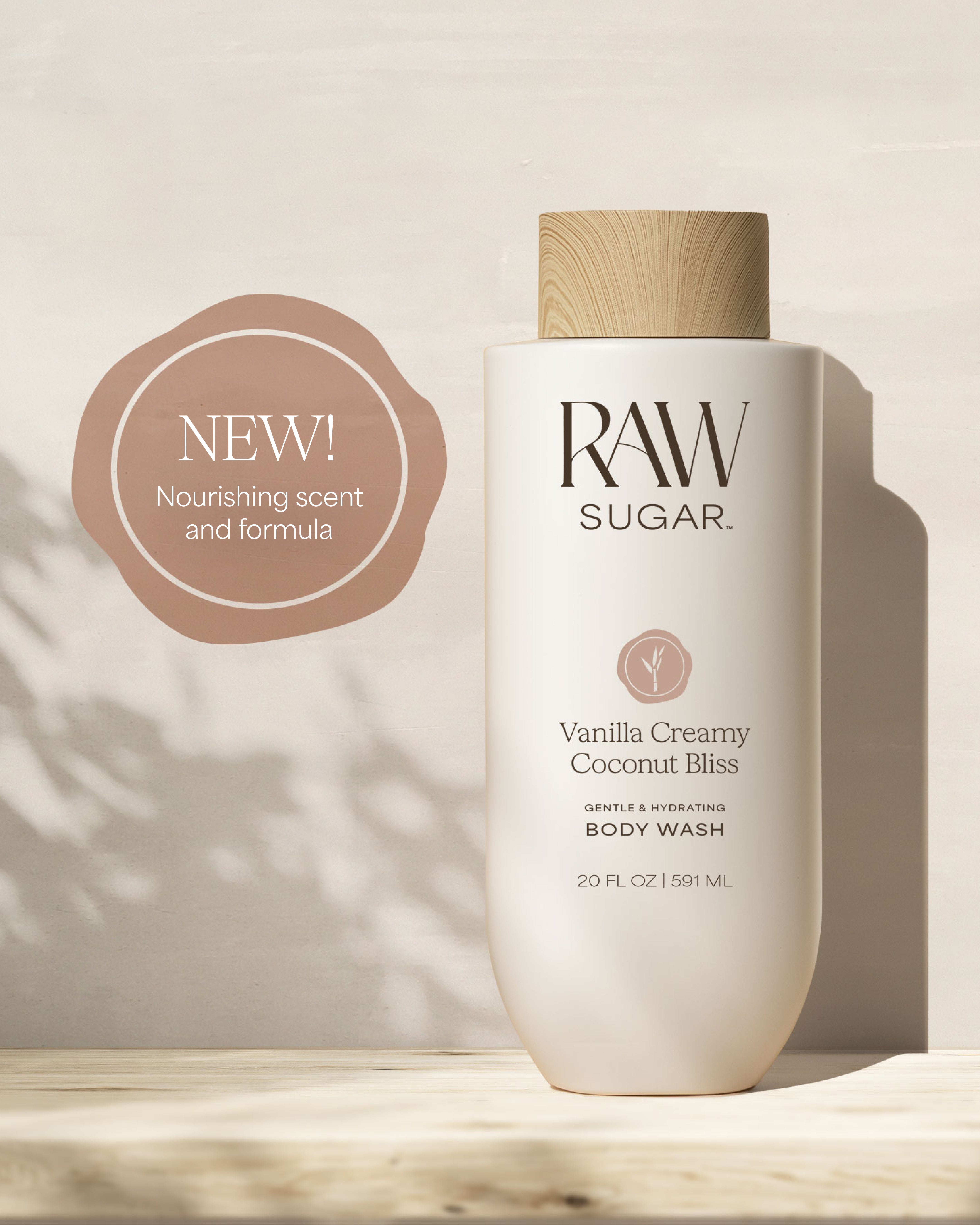 RAW Sugar Vanilla Creamy Coconut Bliss body wash bottle on a neutral background, designed to help gently cleanse and hydrate skin with clean ingredients.