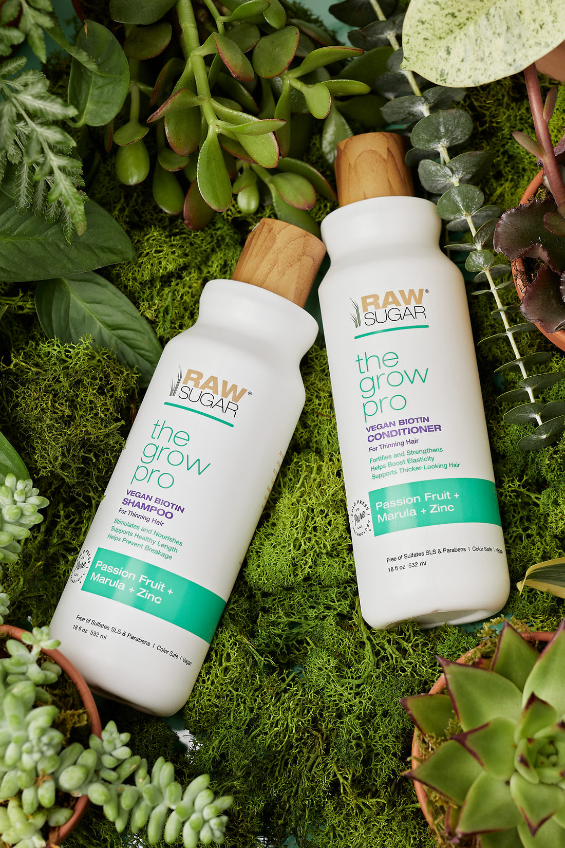 grow pro shampoo and conditioner sitting in plants