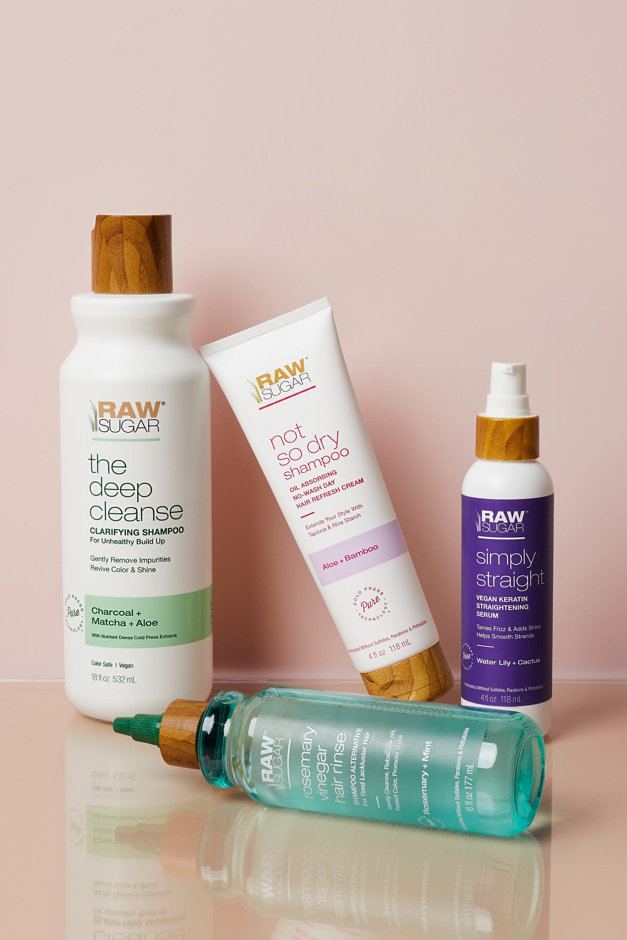 image of new hair care together clarifying shampoo, dry shampoo, straightening serum, rosemary vinegar rinse