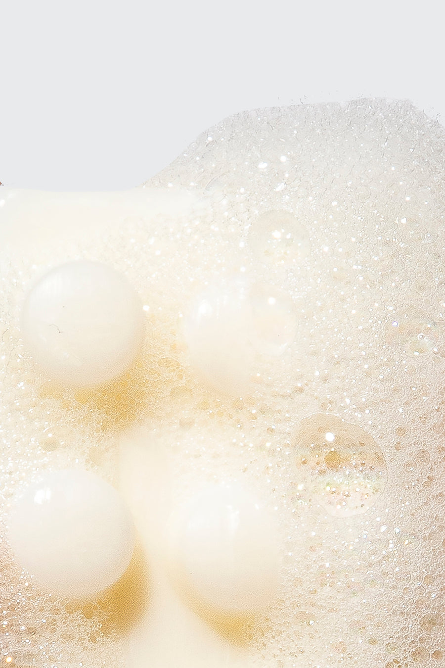 zoomed in image of bar soap covered in suds