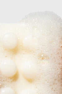 up close image of bar soap with suds around