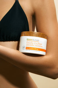 person holding body butter