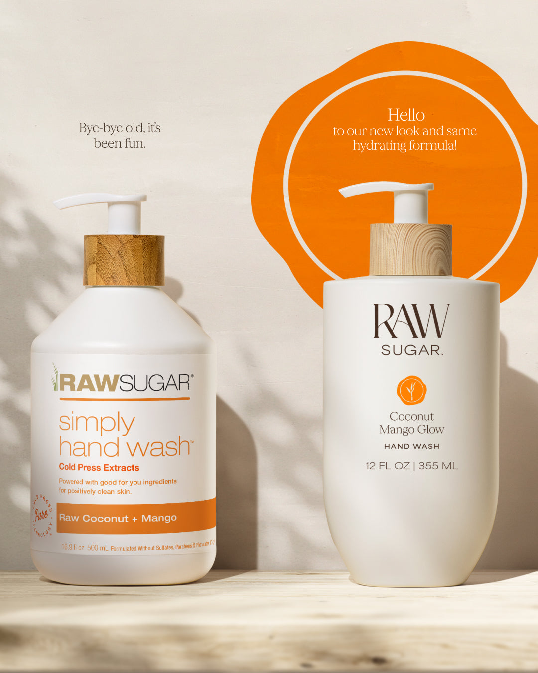 Two bottles of Raw Sugar hand wash on a light background, designed to help gently cleanse hands with clean ingredients.