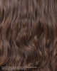 before and after using Mighty Curl Shampoo, designed to help cleanse curly hair with clean ingredients.
