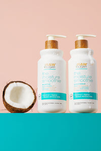 shampoo and conditioner next to coconut half
