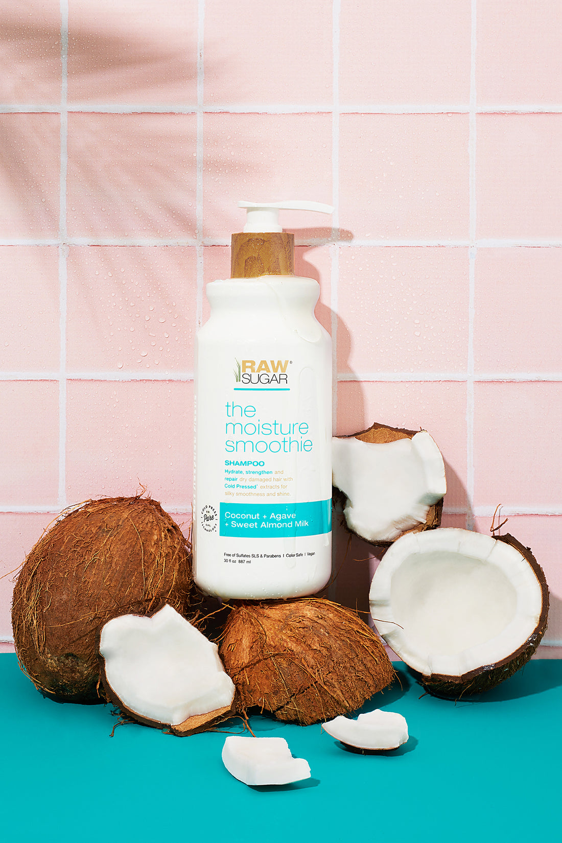 shampoo in bathroom next to coconut halves