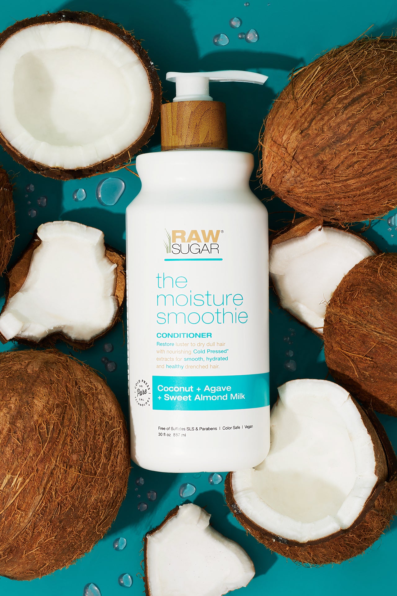 conditioner laying next to cut open coconuts