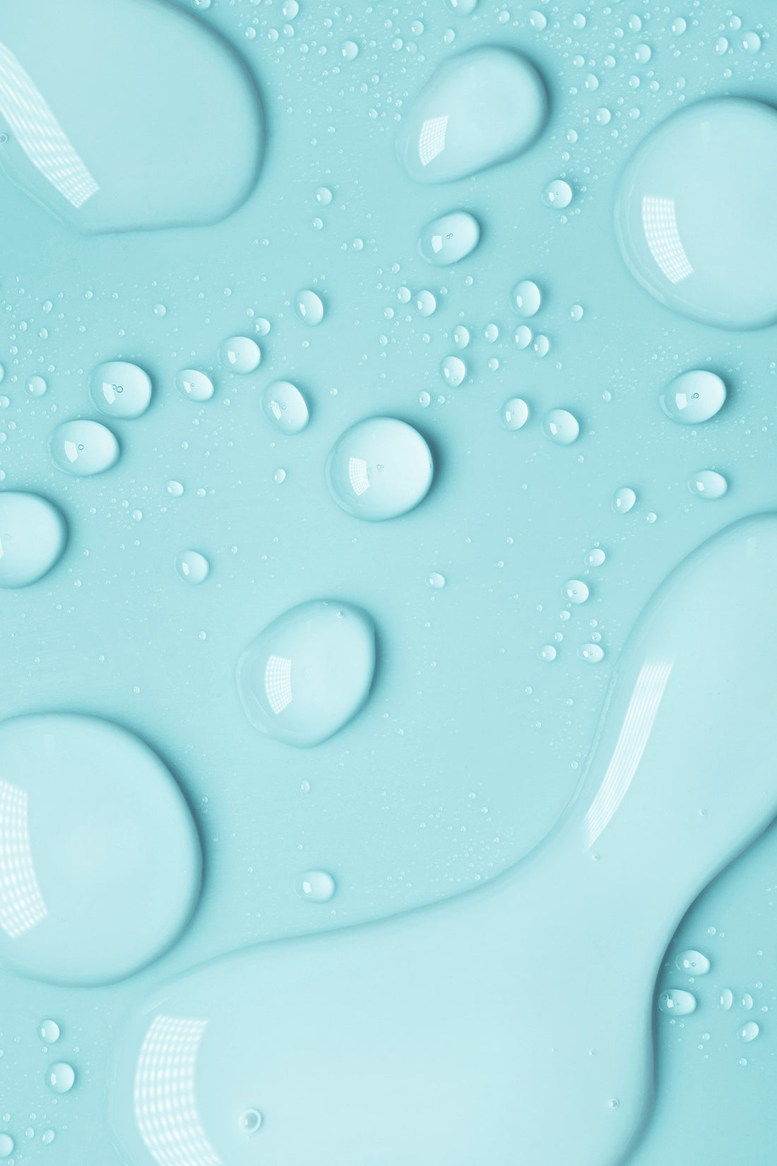 fresh water drops on a soft blue background