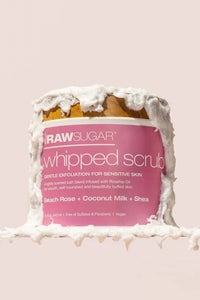 Raw Sugar Whipped Scrub all over jar on pink background