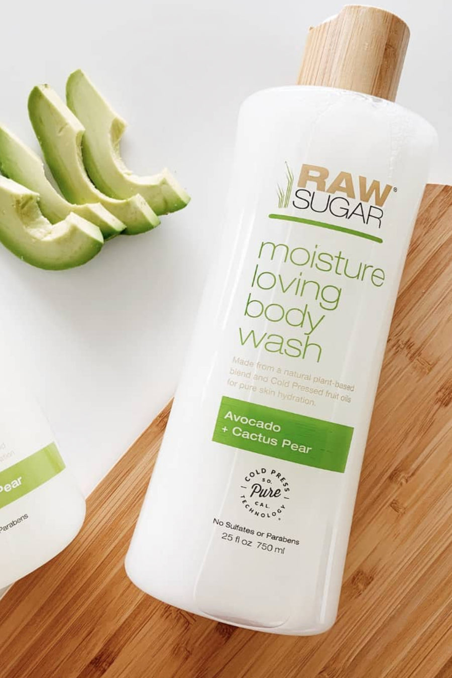 body wash on cutting board next to avocado slices