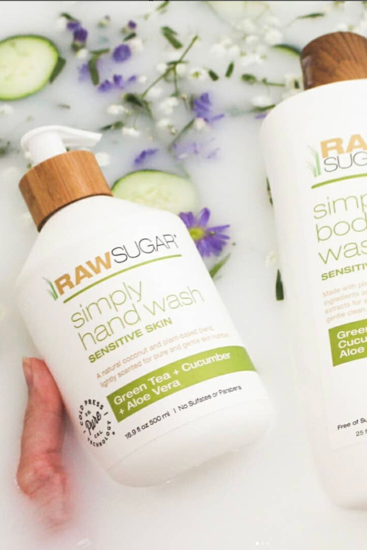 Hand holding wash in milk bath