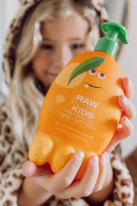 Girl holding Mango Lotion