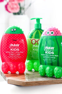 Three Kids products on a wooden tray in a bathroom