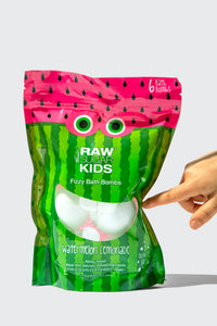 One Raw Sugar Kids Watermelon + Lemonade fizzer bag with a finger pointing to right side from hand