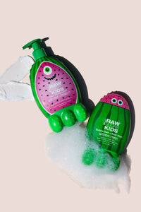 Watermelon Kids Products with Suds and Lotion on Pink Background