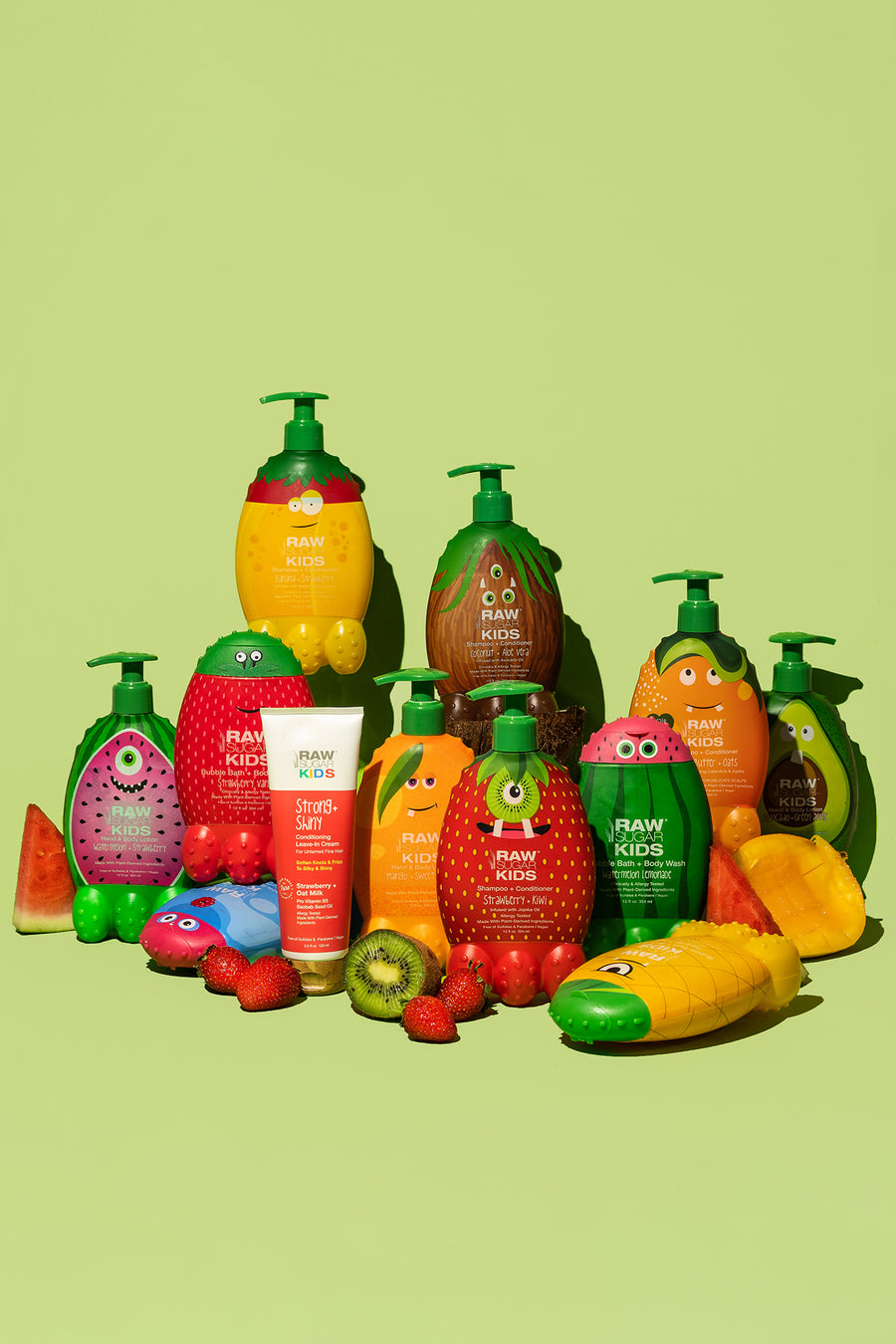 Raw Sugar Kids products grouped together with fresh strawberries, kiwi, mango and watermelon