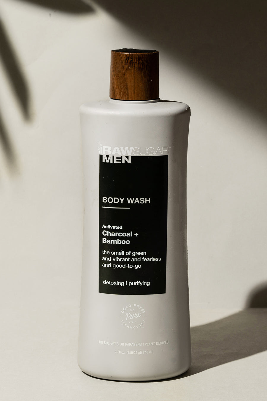 charcoal body wash with plant shadow